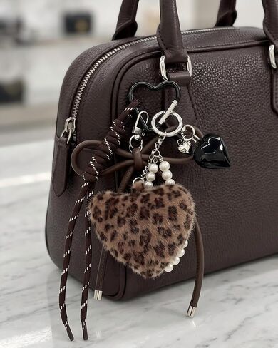 Leopard Print Plush Heart Keychain Charms - Y2K Style Fluffy Pom-Pom Bag Charm with Braided Rope, Brown Bowknot Cheetah Key Chains for Purse Handbags Backpacks Car Keys in Saudi Arabia