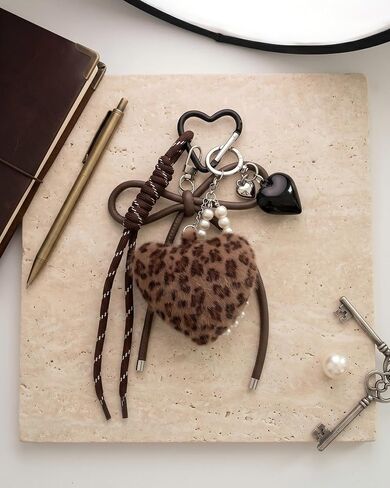 Leopard Print Plush Heart Keychain Charms - Y2K Style Fluffy Pom-Pom Bag Charm with Braided Rope, Brown Bowknot Cheetah Key Chains for Purse Handbags Backpacks Car Keys in Saudi Arabia