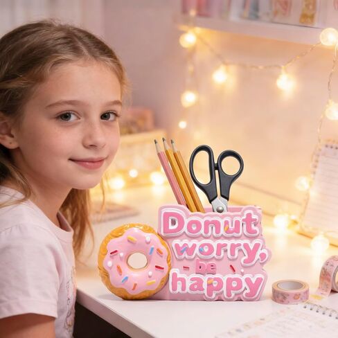ZAWUU Donut Shaped Organizer - Cute Pink Resin Donut Worry, Be Happy Multi-Use Holder for Pens, Makeup Brushes, Utensils, and More – Perfect Desk or Kitchen Accessory Gift in Saudi Arabia