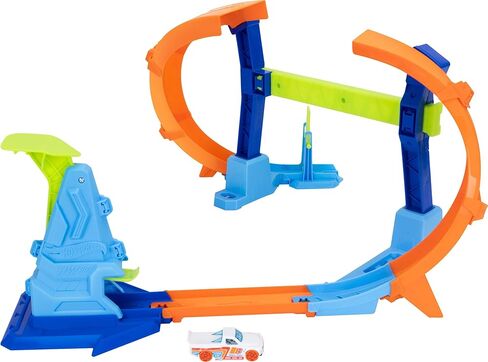 Hot Wheels Toy Car Track Set, Flip & Jump Through the Corkscrew Loop with a 1:64 Scale Toy Car, Speed Snap Track & Adapters, Compresses for Storage in Kuwait