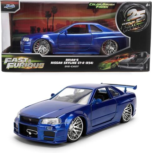 Jada Toys Fast & Furious 1:24 إصدار الذكرى السنوية 1999 Nissan Skyline GT-R (BNR34) سيارة مصبوبة - لمسة نهائية معدنية زرقاء مع غطاء رأس مفتوح وأبواب وصندوق السيارة in Kuwait