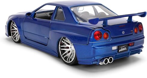Jada Toys Fast & Furious 1:24 إصدار الذكرى السنوية 1999 Nissan Skyline GT-R (BNR34) سيارة مصبوبة - لمسة نهائية معدنية زرقاء مع غطاء رأس مفتوح وأبواب وصندوق السيارة in Kuwait