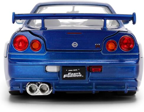 Jada Toys Fast & Furious 1:24 إصدار الذكرى السنوية 1999 Nissan Skyline GT-R (BNR34) سيارة مصبوبة - لمسة نهائية معدنية زرقاء مع غطاء رأس مفتوح وأبواب وصندوق السيارة in Kuwait