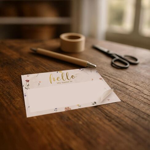 ملصقات Mobiusea Creation Hello My Name برقائق ذهبية | 100 قطعة من ملصقات الأسماء على شكل زهرة برية للملابس | ملصقات أسماء لاصقة لحفلات الزفاف، والحفلات، ولم شمل الأسرة، وحفلات الزفاف، والفصول الدراسية in Kuwait