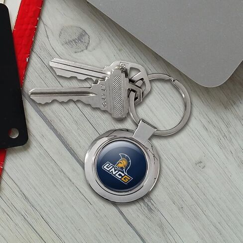 سلسلة مفاتيح بشعار UNC Greensboro الأساسي دائرية أنيقة من المعدن المطلي بالكروم in Kuwait