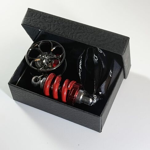 A gift box containing cool car wheel hub brake calipers and shock absorber car rearview mirror decorations. The brake calipers can rotate. It is a must-have for car enthusiasts. in Kuwait