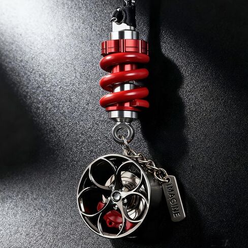 A gift box containing cool car wheel hub brake calipers and shock absorber car rearview mirror decorations. The brake calipers can rotate. It is a must-have for car enthusiasts. in Kuwait