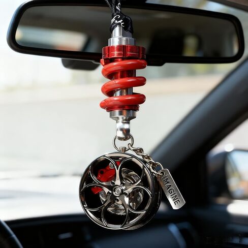 A gift box containing cool car wheel hub brake calipers and shock absorber car rearview mirror decorations. The brake calipers can rotate. It is a must-have for car enthusiasts. in Kuwait