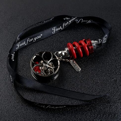 A gift box containing cool car wheel hub brake calipers and shock absorber car rearview mirror decorations. The brake calipers can rotate. It is a must-have for car enthusiasts. in Kuwait