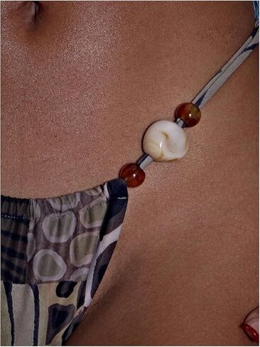 Women's High Cut Beaded Bikini Bottom Tie Side Cheeky Thongs Graphic Booty Swim Panty in Saudi Arabia