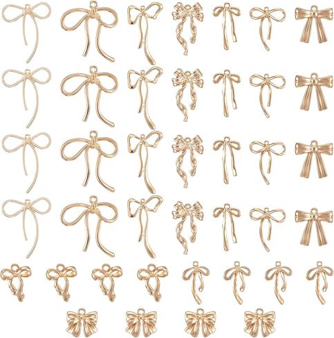 40 Pcs Gold Alloy Bowknot Charms Cute Mini Bowknot Dangle Charms Bow Bow Pendant Charm for DIY Christmas Decorate, Crafts Supplies, Necklace in Kuwait