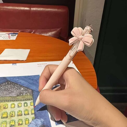 cute pink ballpoint bow pens for girls, aesthetic kawaii retractable pens sets for gift, soft grip pen office smooth writing school supplies, coquette party favors stuff for desk accessories (10 pcs ) in Saudi Arabia