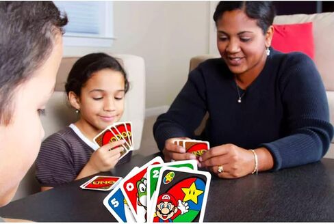 مجموعة بطاقات Ultimate Super Mario UNO - حزمة مع مجموعتين من بطاقات UNO لألعاب الفيديو للأطفال بالإضافة إلى الملصقات، المزيد | أنشطة سوبر ماريو بروس للأطفال، ليلة الألعاب العائلية in Kuwait