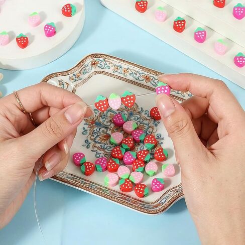 150 قطعة من خرز الفراولة من طين البوليمر، خرز فراولة على شكل شريحة مع خرز فاصل صغير للفواكه لقلادة السوار DIY (3 ألوان) in Kuwait