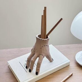 This includes a terrifying finger pen holder, a chilling hand-decorated flower pot,an eerie desktop decor, a humorous horror office accessory, and a gothic-style relocation gift(coffee brown) in Saudi Arabia