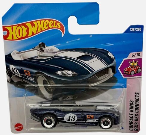 هوت ويلز - Rrroadster - Compact Kings 5/10 - JBB97 - بطاقة قصيرة - Roadster باللون الأزرق الداكن مع خطوط السباق بمقياس 1:64 - Mattel 2025 in Kuwait