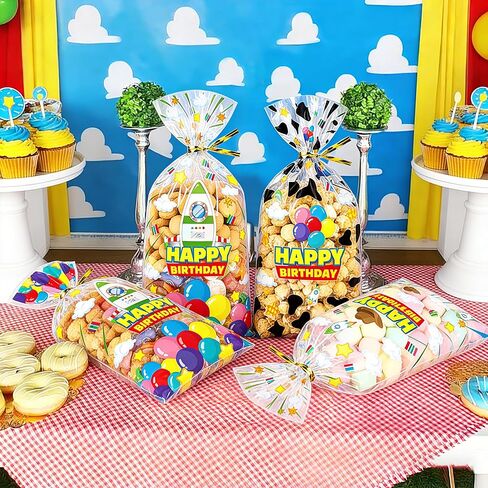 CHENRINDECO 100Pcs Cartoon Story Clear Treat Bags Blue Sky White Clouds Rocket Design Goodie Bags for Birthday Party Cartoon Theme Party Favor Supplies in Saudi Arabia