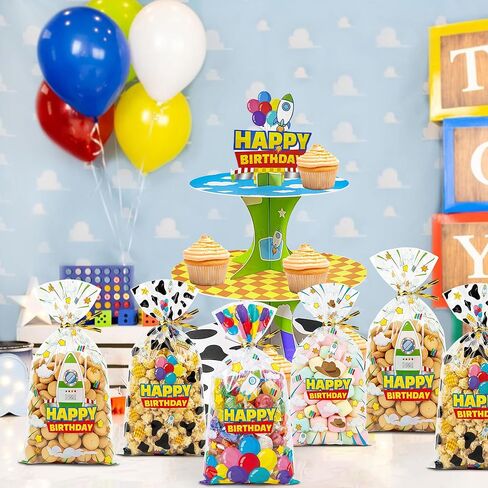 CHENRINDECO 100Pcs Cartoon Story Clear Treat Bags Blue Sky White Clouds Rocket Design Goodie Bags for Birthday Party Cartoon Theme Party Favor Supplies in Saudi Arabia