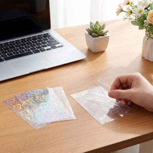 300 PCS Laser Flashing Photocard Sleeves Love Heart Shape Transparent Holographic Card Sleeves Trading Cards Protective Cover for Photo Cards, 3.58 × 2.56 inches in Saudi Arabia