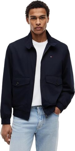 سترة Tommy Hilfiger للرجال من القطن خفيف الوزن مع شعار العلم المطرز وجيوب متعددة الاستخدامات in Kuwait
