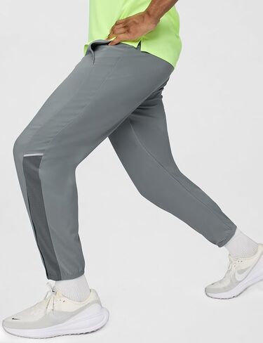 بنطال الجري المنسوج Miler Dri-FIT من نايك للرجال in Kuwait