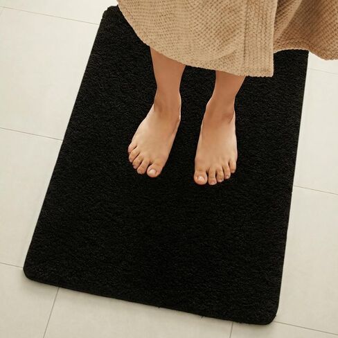 TYUU Black Bathroom Rug, Ultra Soft Bath Rugs Non Slip Washable, Super Absorbent Quick Dry Small Bath Mat with Rubber Backing for Bathroom Floor, Shower, or Sink, Black 16" x 24" in Saudi Arabia