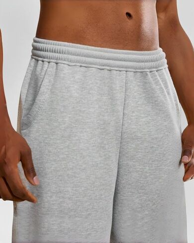شورت رياضي فضفاض للرجال تحت الركبة، شورت فضفاض غير رسمي من Gym Y2K بحاشية خام مع خصر برباط in Kuwait