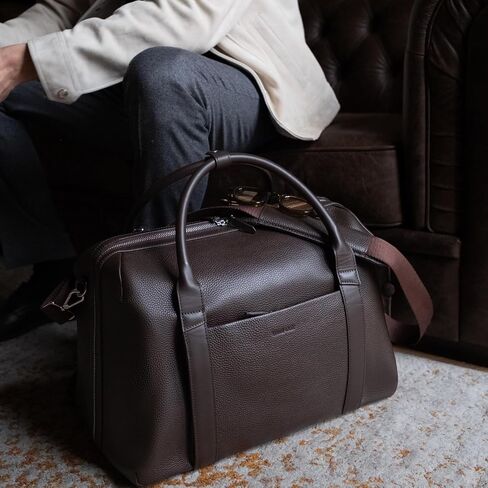 Wool & Oak Duffle Suitcase – Full-Grain Leather Travel Bag with Clamshell Opening, 33 L Capacity, Trolley Sleeve & 16″ Laptop Pocket – “DS Carry" Personal-Item Size - Pebble Leather - Chocolate in Saudi Arabia