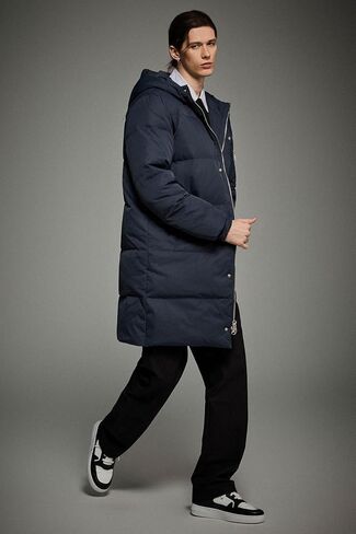 Orolay Men's Quilted Down Jacket – Windproof, Water-Resistant, Hooded Puffer Coat with Pockets for Winter Sports in Kuwait