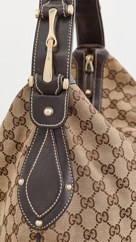 WHAT GOES AROUND COMES AROUND Women's Pre-Loved Gucci Brown Canvas Pelham Hobo Bag in Saudi Arabia