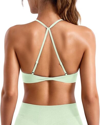 VOYJOY Twist Cross Back حمالات صدر رياضية مبطنة قابلة للتعديل برقبة على شكل حرف U حمالات صدر للتمرين للنساء للياقة البدنية واليوجا ملابس علوية قصيرة ذات تأثير منخفض in Kuwait