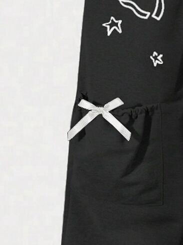 Girls' Fashionable Casual Pants, Black Straight Leg Pants paired with Cute cat and Star Prints, Bow Pocket Design in Kuwait