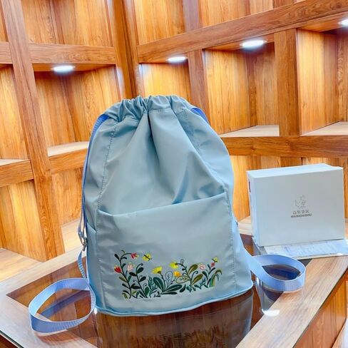 Foldable Women Drawstring Backpack, Shopping Bag, Waterproof Portable Travel Backpack for Sports Yoga Fitness (Light Blue) in Saudi Arabia