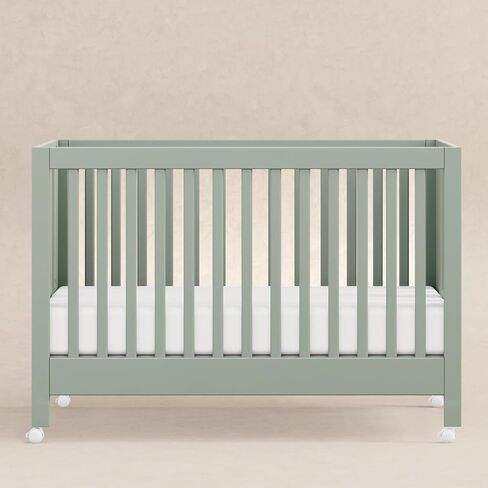 Babyletto Maki Full-Size 2-in-1 Portable Folding Crib with Toddler Bed Conversion Kit in Light Sage, Greenguard Gold Certified in Saudi Arabia