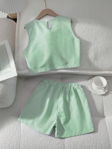 Two piece elegant casual girl plaid set, fashionable waterdrop button sleeveless top+sports shorts in Kuwait