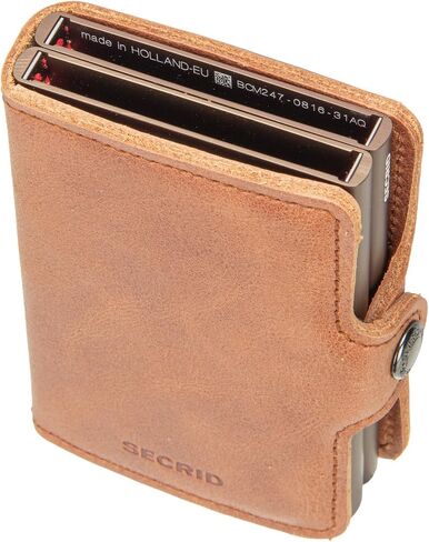Secrid This is a compact wallet with two Cardprotectors that double the capacity. Equipped with a sturdy closure and a durable leather outer cover. Capacity: 8 cards in relief or 12 in Saudi Arabia
