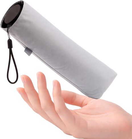 Compact Sun Umbrella for Easy Carry, Lightweight Travel Size, Sun & Rain Ready in Saudi Arabia