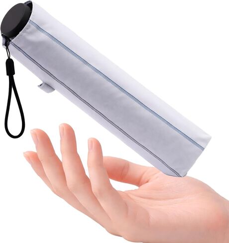 Compact Sun Umbrella for Easy Carry, Lightweight Travel Size, Sun & Rain Ready in Saudi Arabia