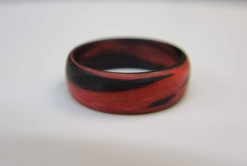 Carbon Fiber Red/Orange Marbled Glow Ring, Matte Finish, Glow-in-the-Dark, Durable, Waterproof, Sizes 4-16, Custom Bandwidths, Made in USA in Saudi Arabia