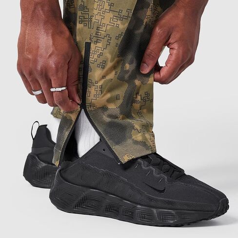 بنطال Nike Tech Dri-FIT المنسوج المموه المدبب المموه للرجال مقاس كبير in Kuwait