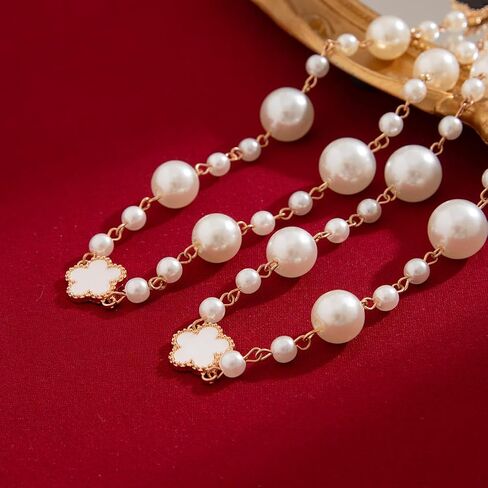 Chic Multi-Layered Pearl Necklace with Golden and Black Flower Accents for Women, Elegant Long Statement Jewelry with Clover Accents, Elegant Statement Piece for Special Occasions in Kuwait