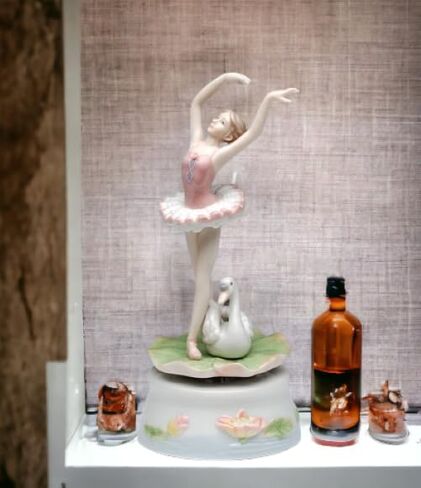 Cosmos Gifts Fine Porcelain Swan Lake Ballerina Ballet Dancer in Pink Tutu on Lily Pad with Swan Music Box Figurine Plays Swan Lake Music Tune, 7-3/8 in in Kuwait