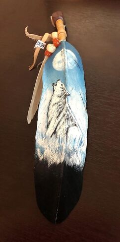 Wolf Hand Painting on a Large Feather by Jose Carmelo Canales in Saudi Arabia