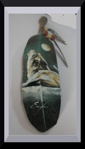 Wolf Hand Painting on a Large Feather by Jose Carmelo Canales in Saudi Arabia