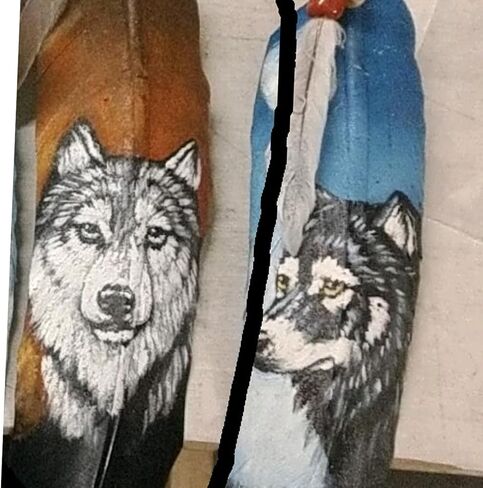 Wolf Hand Painting on a Large Feather by Jose Carmelo Canales in Saudi Arabia