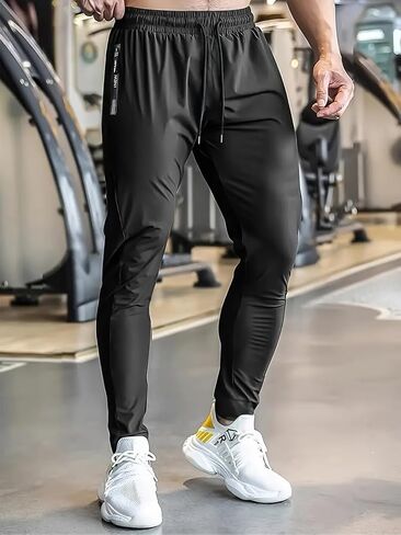Mens Quick Dry Sweatpants Elastic Waist Drawstring Fitness Pants for Workout Casual Wear in Kuwait