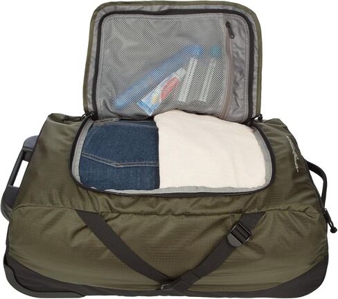 Eddie Bauer Traverse Rolling Duffel Bag-Made from Ripstop Polyester with Telescoping Handle, Black, 78L in Saudi Arabia