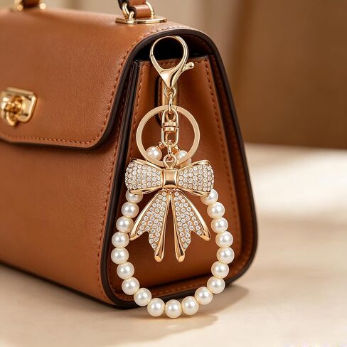 White Rhinestone Bowknot Keychain with Imitation Pearl Chain, Sparkly Bow Purse Charm Bag Accessories for Women Handbags Backpacks Wallets in Saudi Arabia
