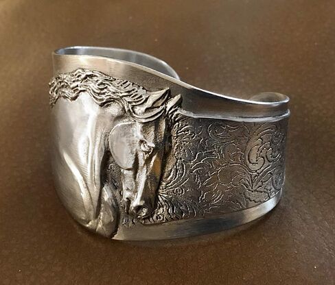 Stallion cuff bracelet, Friesian Horse head in high relief in Saudi Arabia