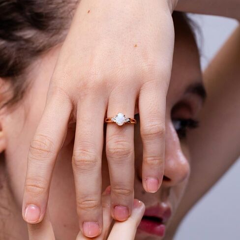 Angara Natural Opal Ring for Women | Solitaire Oval Opal Split Shank Ring with Trio Diamonds in 14K Solid Gold/Sterling Silver/Platinum in Kuwait